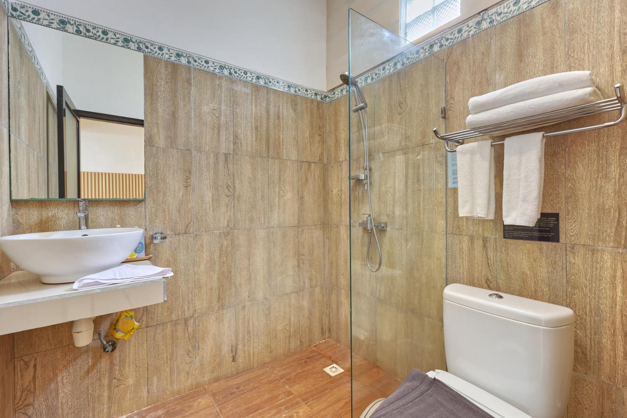 Jnj Guest House Toyapakeh Δωμάτιο φωτογραφία