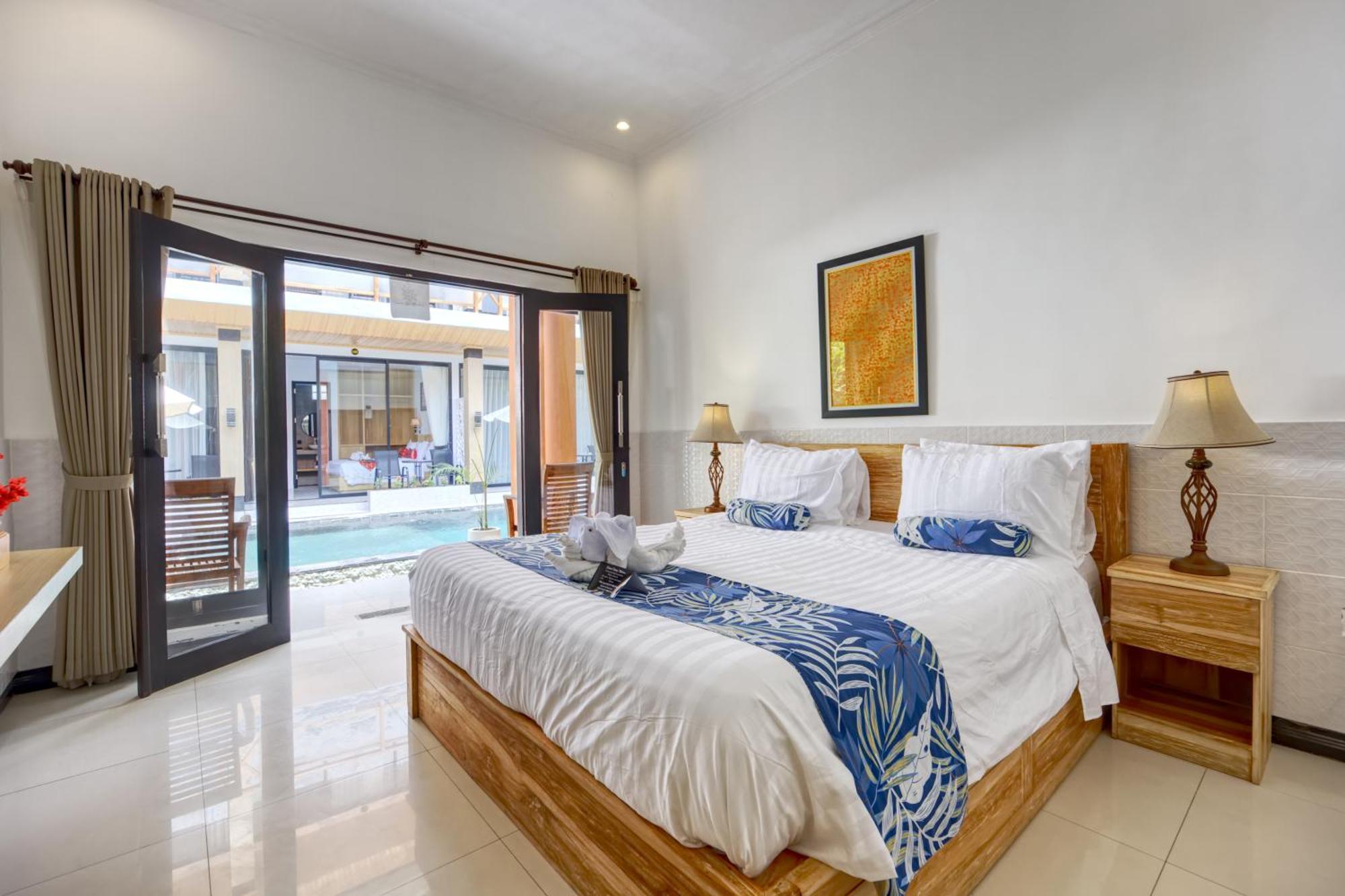 Jnj Guest House Toyapakeh Δωμάτιο φωτογραφία
